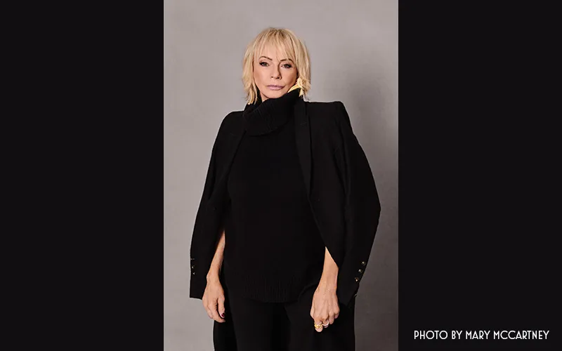 Judy Craymer portrait wearing black outfit